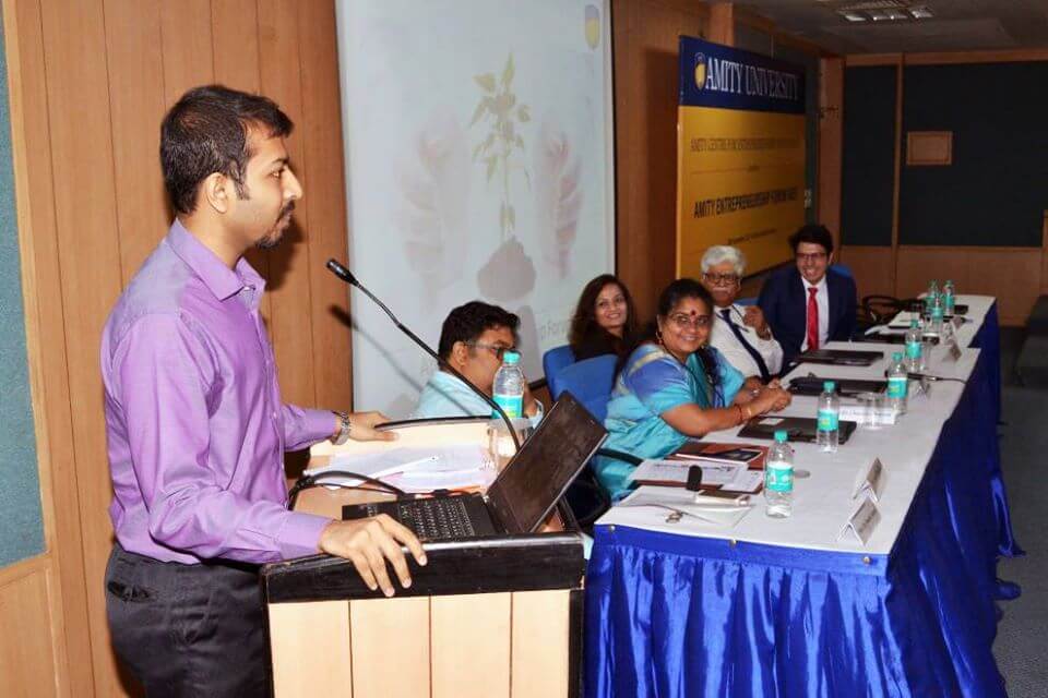 uday sonthalia, Strategic business consultants in New Delhi, man in purple shirt, panel of people sitting