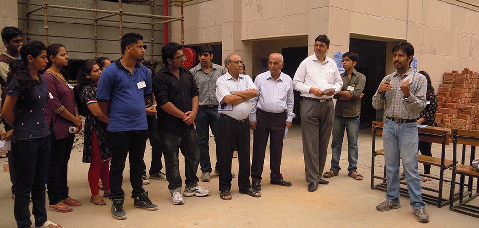 Social Entrepreneurs in New Delhi , people standing on road image