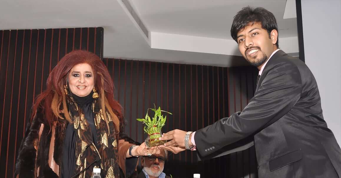 Top young entrepreneurs India, plant giving to a person